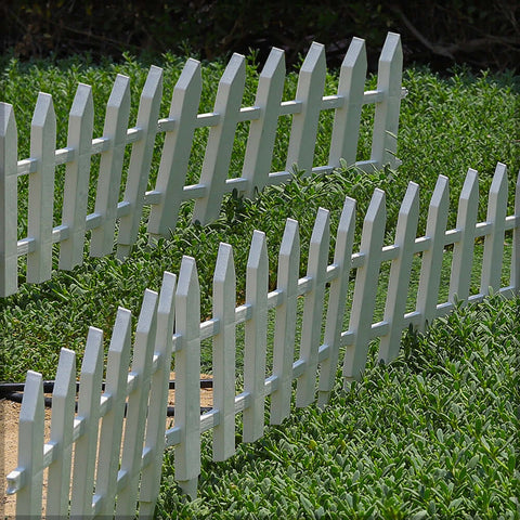 Plastic garden fence providing decorative edging for paths and lawns