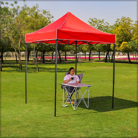 Compact foldable shelter offering quick and easy setup for various outdoor events