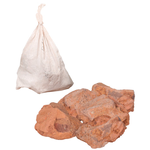 Decorative volcanic rocks in bag for landscaping and fire pits