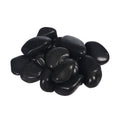 Black garden rocks for use in pathways and edging