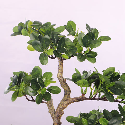 Faux bonsai tree with cajuput design for office spaces