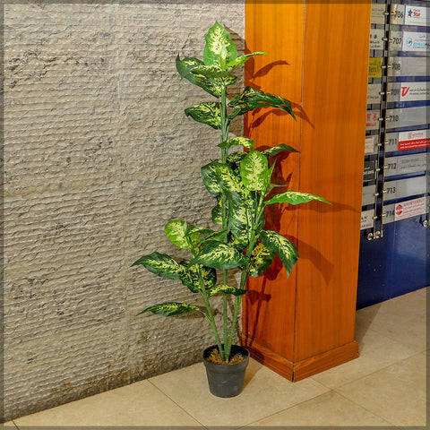 Lifelike fake evergreen trees with lush green leaves