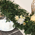 Decorative faux ruscus garland with willow leaves for event decor