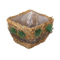 Handwoven raffia basket planter box for garden and patio