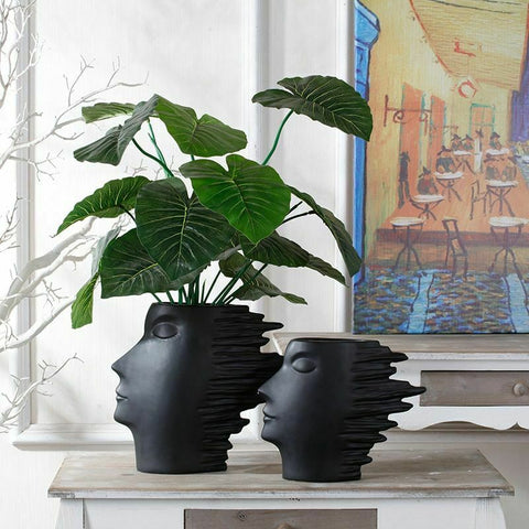 Black ceramic face vase for home and office decor