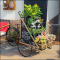 Stylish bicycle flower holder perfect for showcasing floral arrangements in your garden or patio