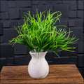 Lifelike artificial grass bunch for landscaping projects