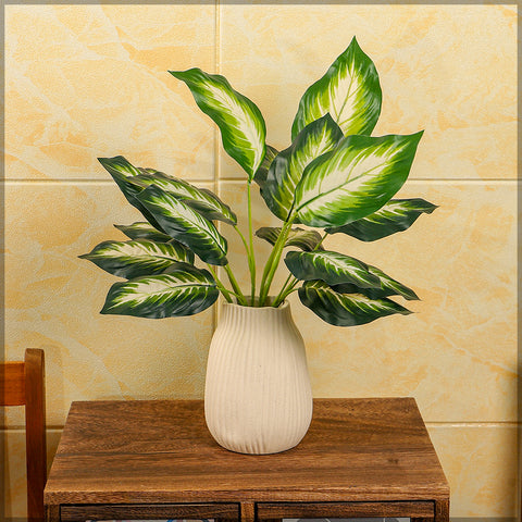 Fake Dieffenbachia plant leaves