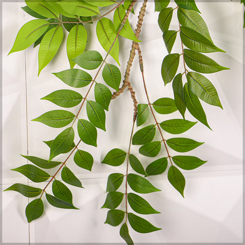 Faux tropical hanging leaves for indoor plants