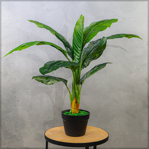 Artificial plant 75cm high on a modern console table