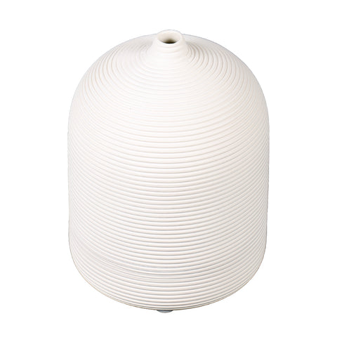 White nordic style ceramic vase on a minimalist shelf