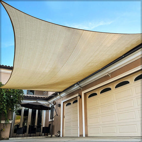 Sun shade sail awning providing UV protection for outdoor spaces