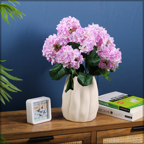 Stylish cream ceramic vase for table displays