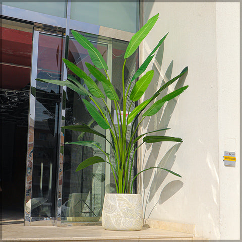 Large faux banana tree for interior design in a contemporary office setting