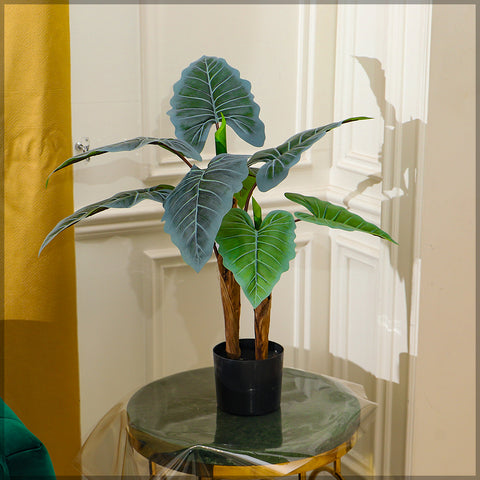 Realistic artificial taro plant for indoor use with vibrant green leaves