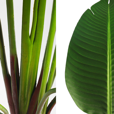 Realistic artificial banana plant for home decor placed in a cozy indoor setting