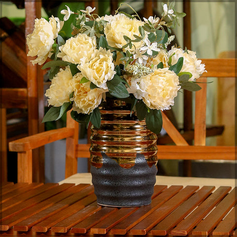 Modern black vase with gold accents for luxury spaces