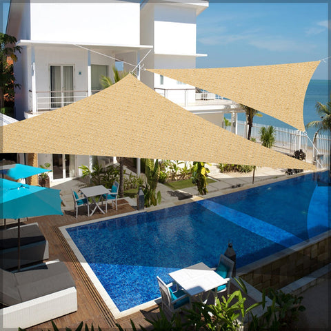 Sun shade sail triangle above a pool