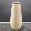 Decorative textured ceramic vase for floral arrangements