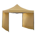 Waterproof shade canopy providing rain and sun protection at the beach