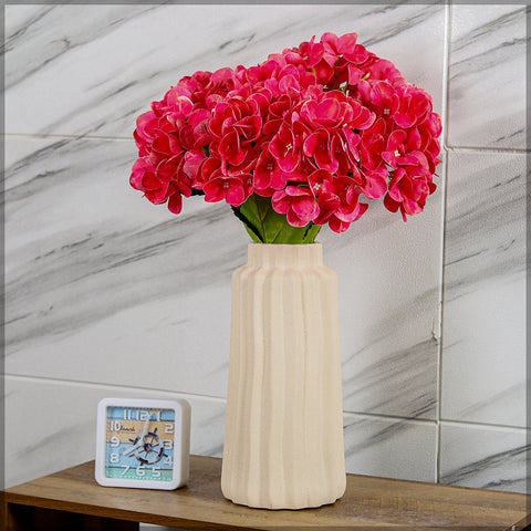 Cream ceramic vase with a sleek modern design