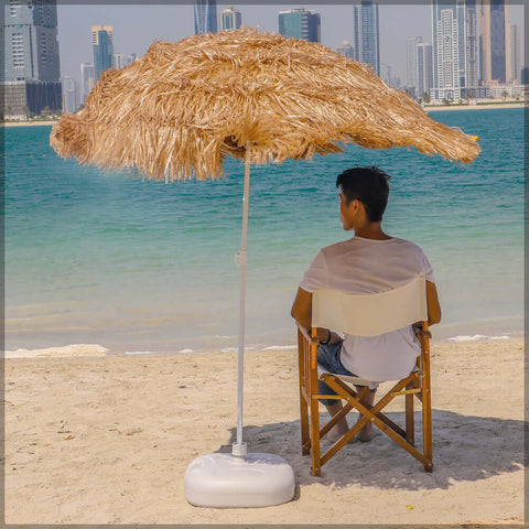 Straw sun umbrella for beach parties and outdoor protection