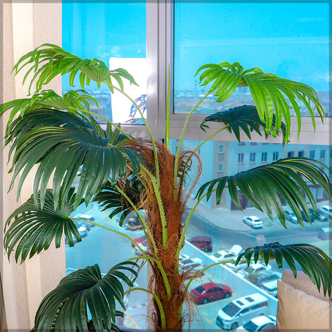 Artificial palm tree for living room with lush greenery