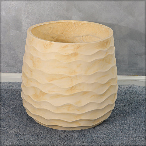 Decorative concrete planter with wavy design