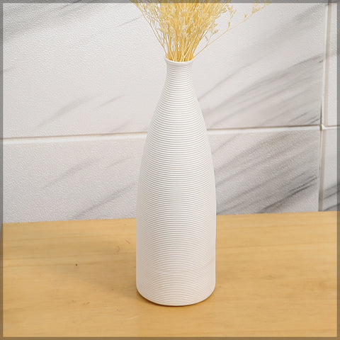 Tall skinny ceramic vase with clean lines for home styling