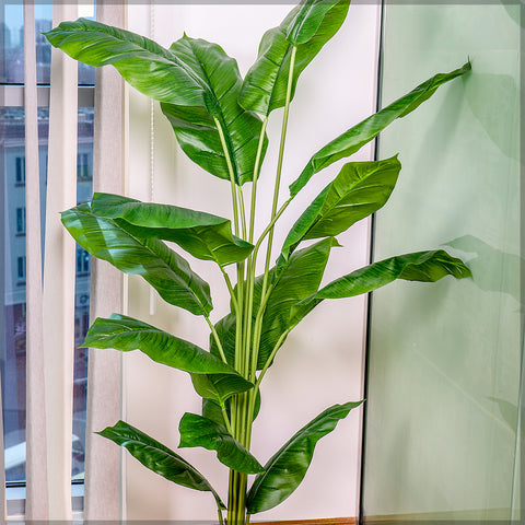 Realistic artificial lily plant for home on a windowsill