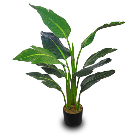 Compact artificial banana plant for home decor in a cozy office