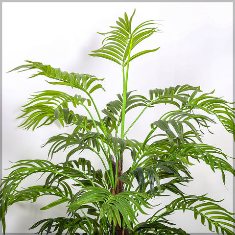 Outdoor artificial palm plants enhancing garden or patio spaces