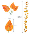 Artificial orange-toned plant leaves for seasonal decor