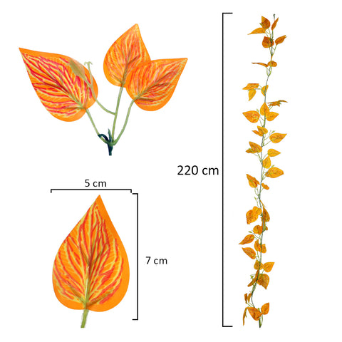 Artificial orange-toned plant leaves for seasonal decor