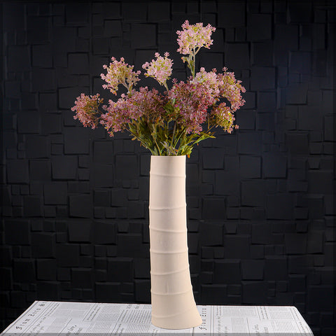 Neutral toned cream ceramic vase for plant display