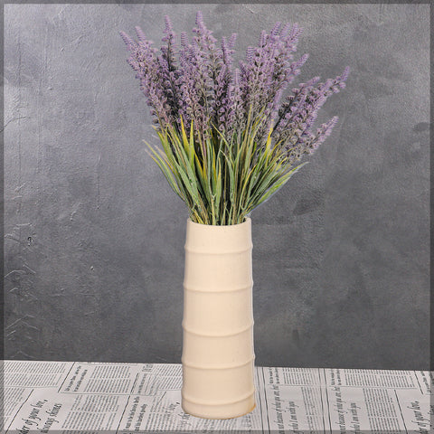 Decorative cream vase for flowers and greenery