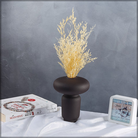 Elegant black ceramic vase for flower displays