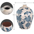 Decorative blue ceramic vase with floral patterns