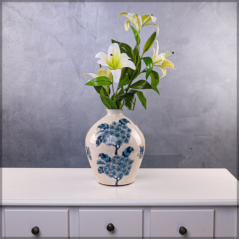 Ceramic flower vase with blue floral design