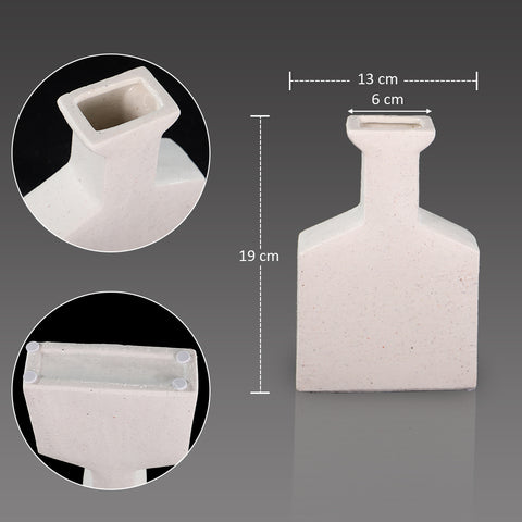 White ceramic vase with bottle shape design