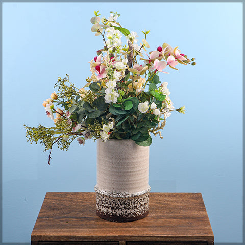 Ceramic cream vase with rustic tones for modern interiors