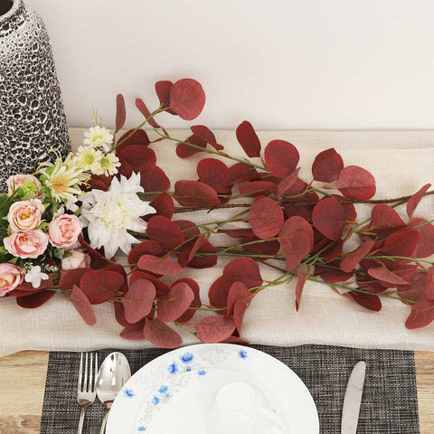 Faux eucalyptus leaves garland hanging for seasonal decor