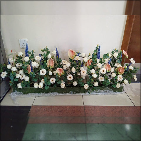 Flower Arrangement in Long Vase