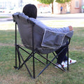 Cushioned camping chair with compact folding design