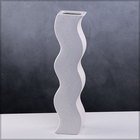 Wave pattern ceramic vase for artistic interior styling