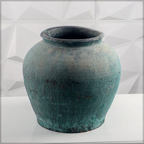 Green round clay pot