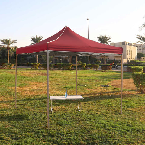 Pop up canopy tent at a garden event, providing shade