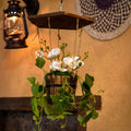 Artificial hanging plants in wooden pots