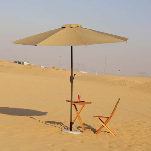 Tilting patio umbrella with adjustable angle canopy