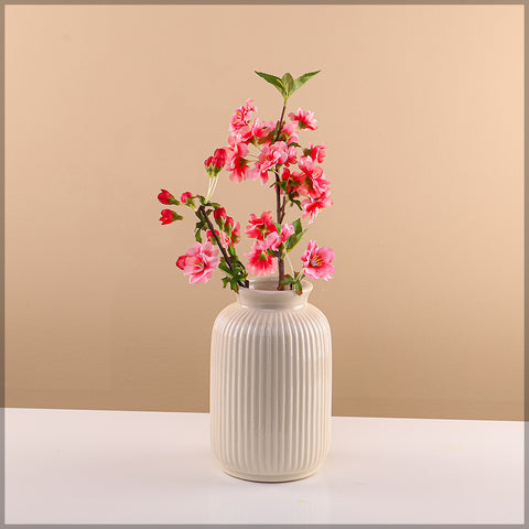 Handmade ceramic vase with etched line designs